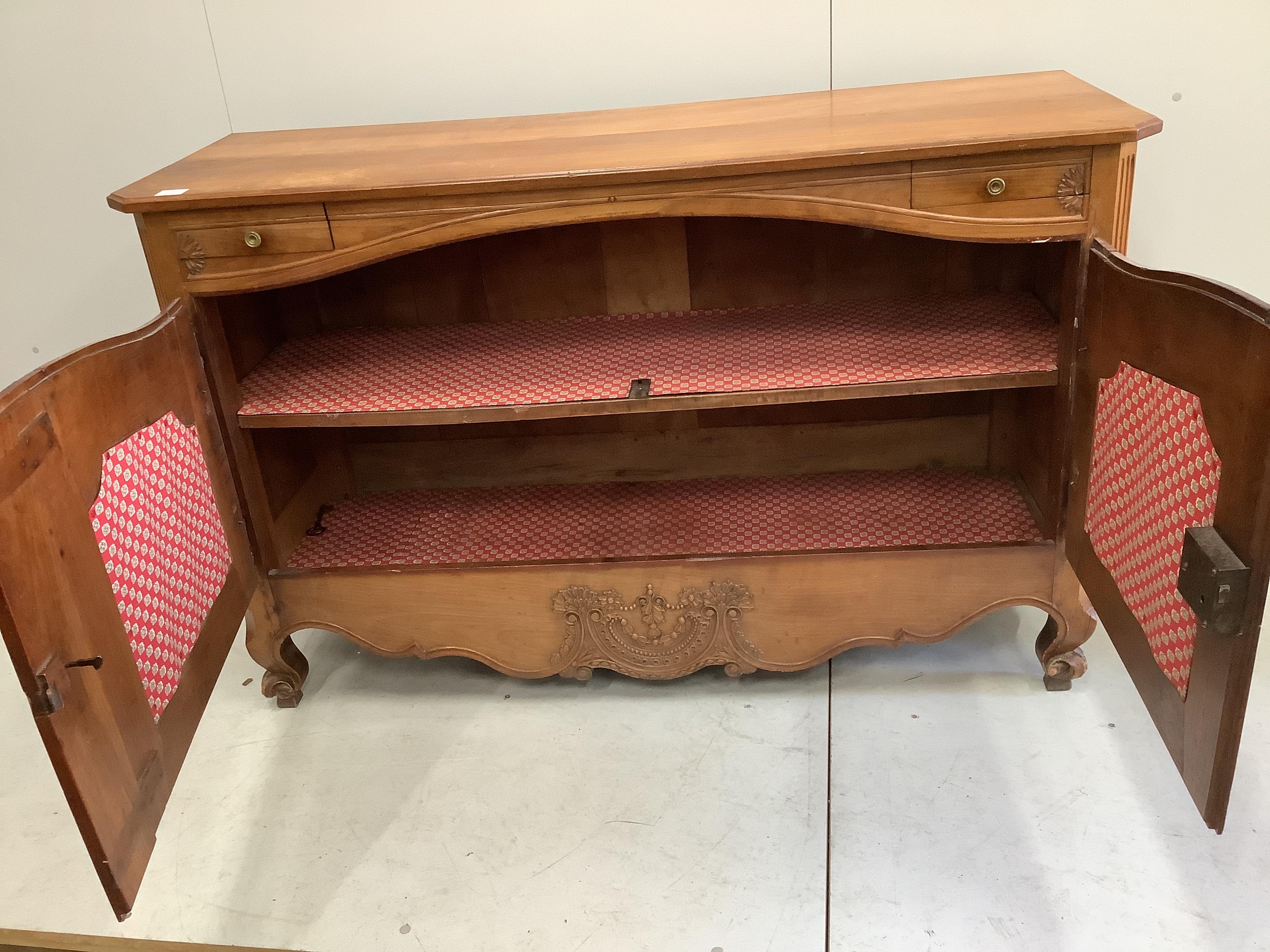 A Louis XV style carved cherry two door buffet, width 151cm, depth 53cm, height 95cm